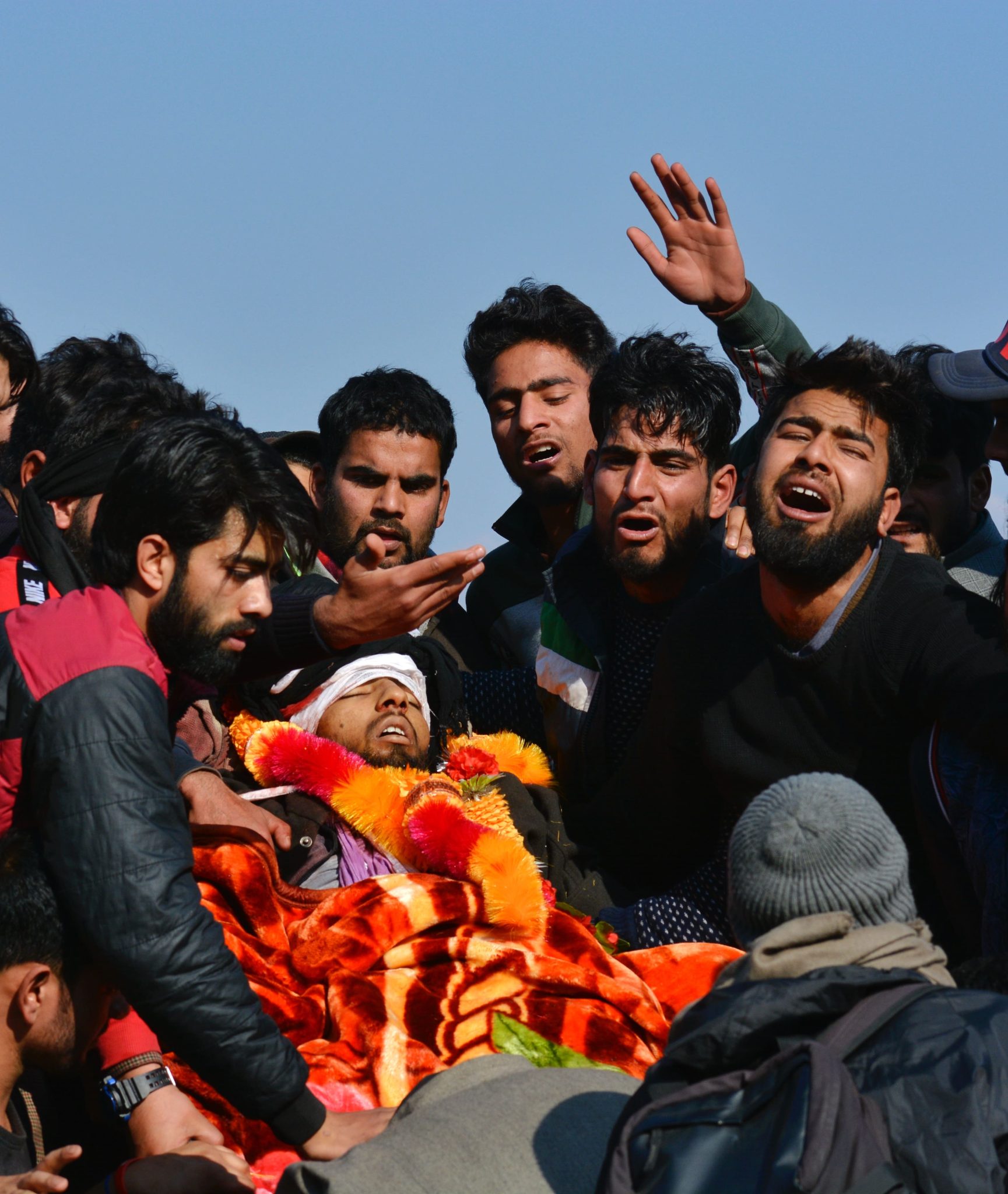 Dec. 15, 2018, Pulwama, Kashmir — Friends and family mourn the death of 18-year-old Owais Yusuf Najar, who was among seven civilians killed when Indian troops fired on protesters after a gunfight with militants that left three rebels and an army soldier dead.