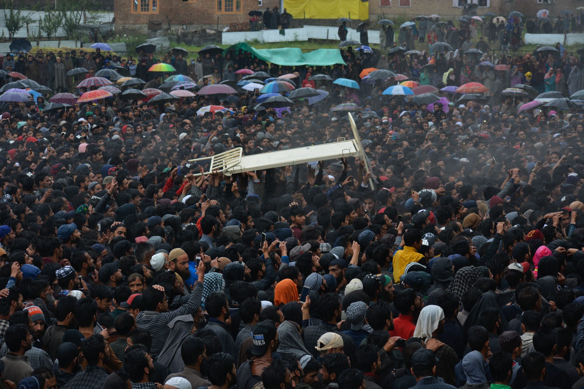 May 24, 2019, Noorpora, Kashmir — Thousands of Kashmiris attend the funeral of militant commander Zakir Musa, who was killed in an 11-hour gun battle with the Indian army.