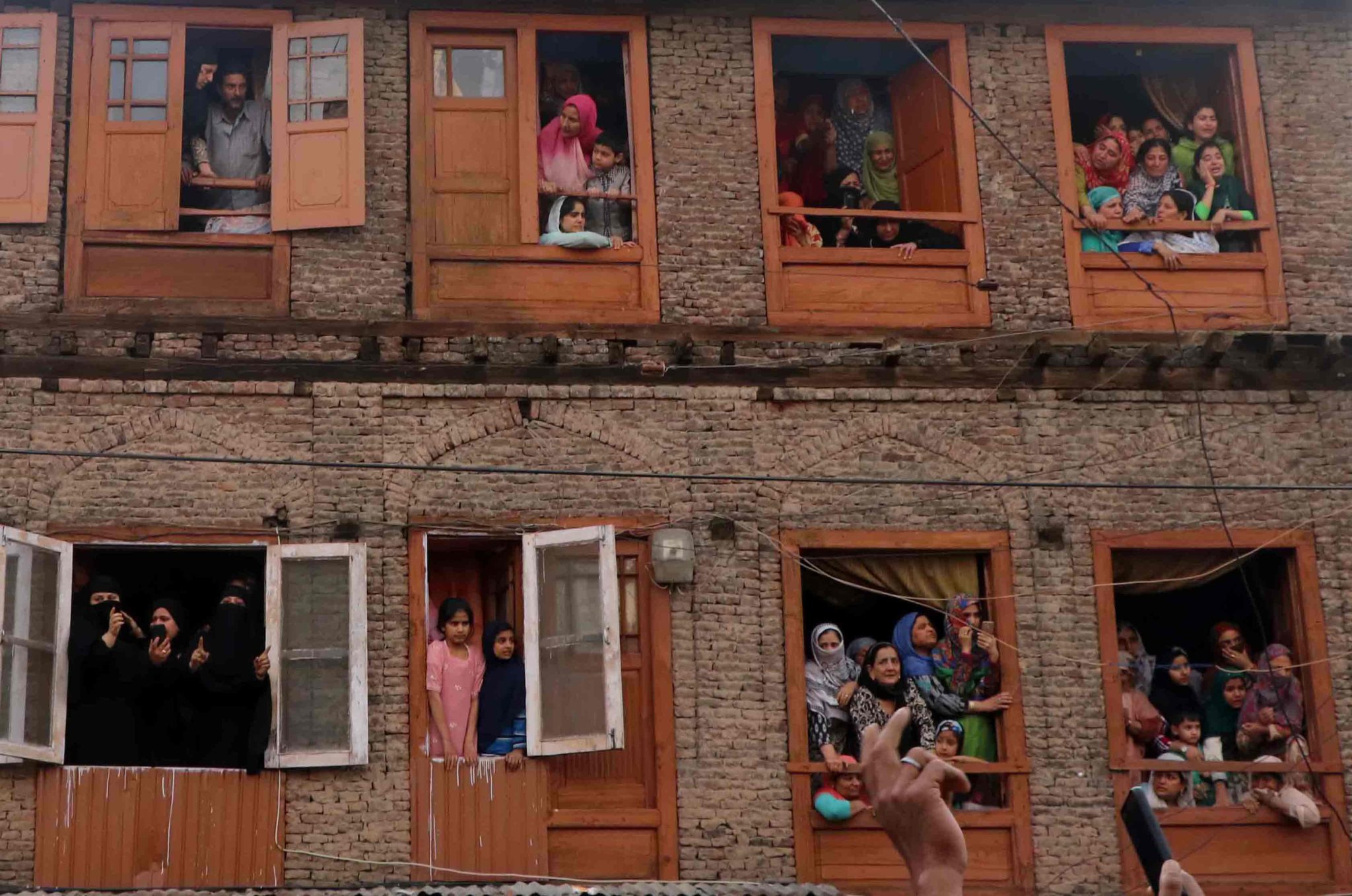 May 5, 2018, Downtown, Srinagar, Kashmir — Crowds gather for the funeral of Fayaz Ahmed Hamal, a Lashkar-e-Taiba militant, and Adil Ahmed Yatoo, a civilian killed by an armored vehicle during clashes with Indian forces. Thousands attended the funeral processions in Srinagar.